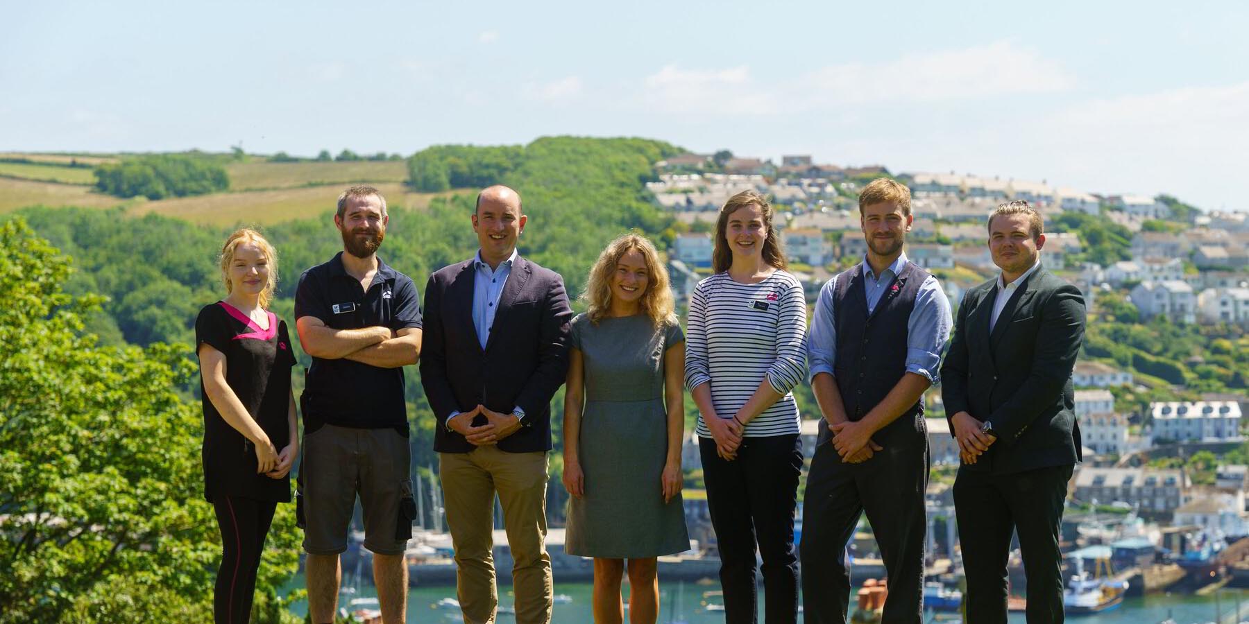 Smiling group on hillside